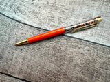 Orange Pen - with white, black and orange gems